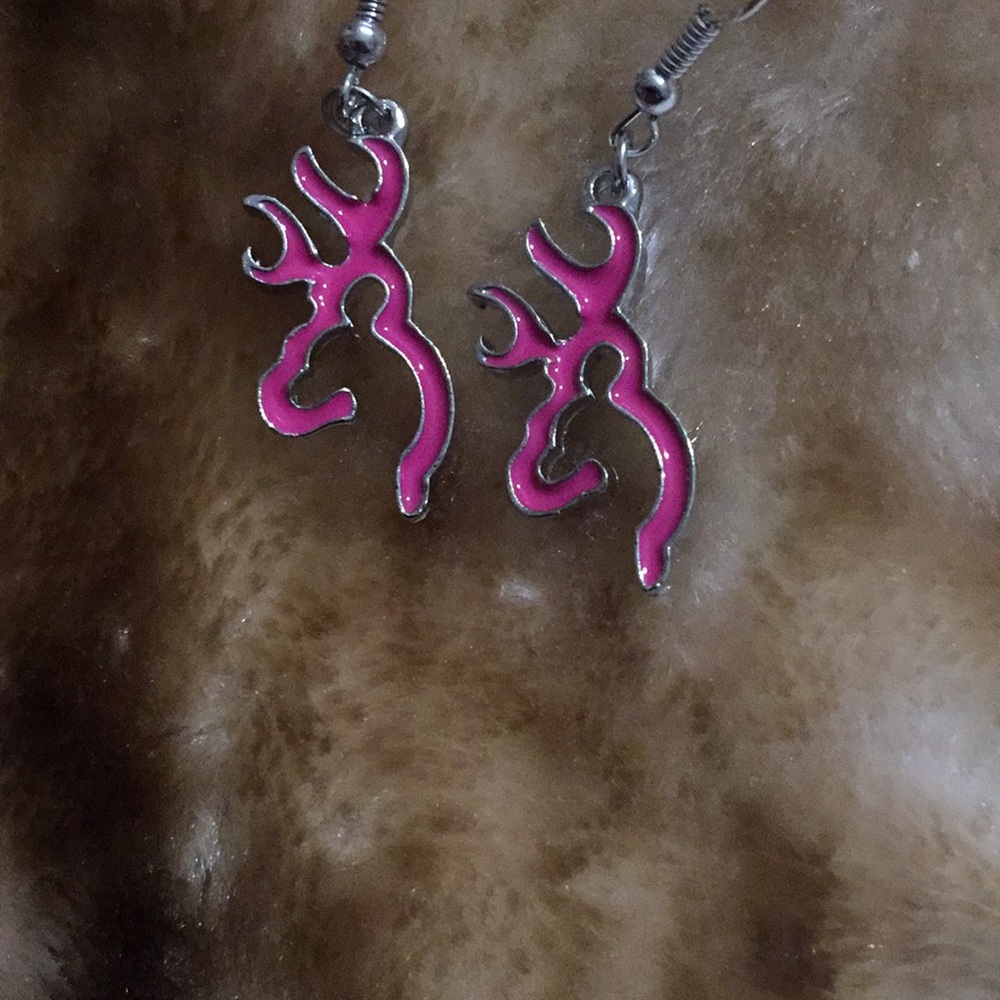 Pink and silver deer shaped earrings. Brand new!